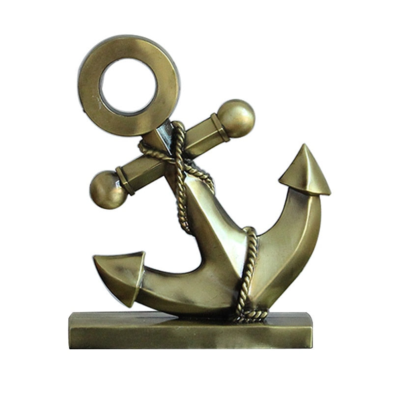 statuette statut décoration ancre mer océan navigation navire bateau gouvernail marins marin compas rose des vents voile voilier ancrage capitaine poisson mât lac fleuve navigation